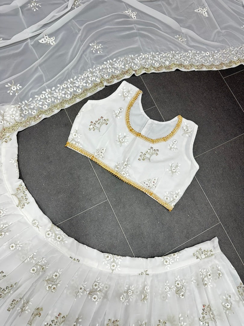 White georgette heavy embroidery work lehenga for ceremony