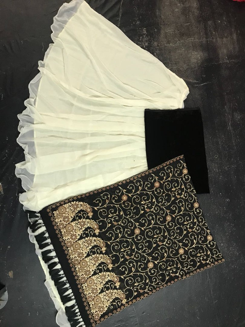 White georgette partywear lehenga with heavy embroidered dupatta