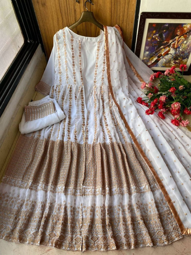 White heavy embroidery worked salwar suit with shrug