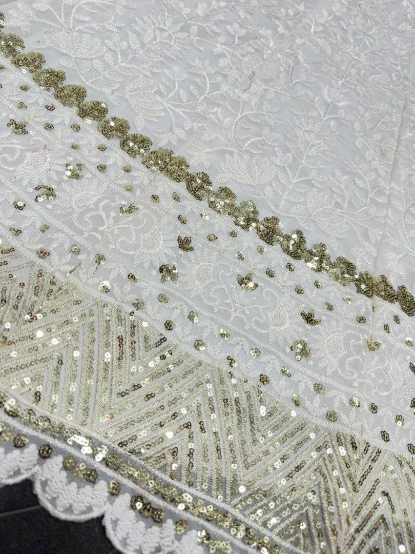 White heavy embroidery worked wedding lehenga choli