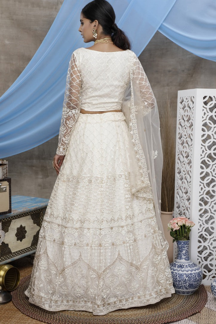 white net heavy embroidered wedding lehenga choli