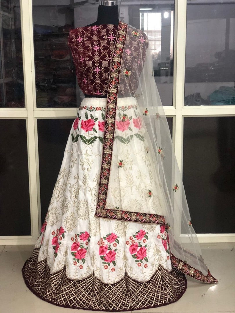 white nylon silk and velvet beautiful embroidered wedding lehenga