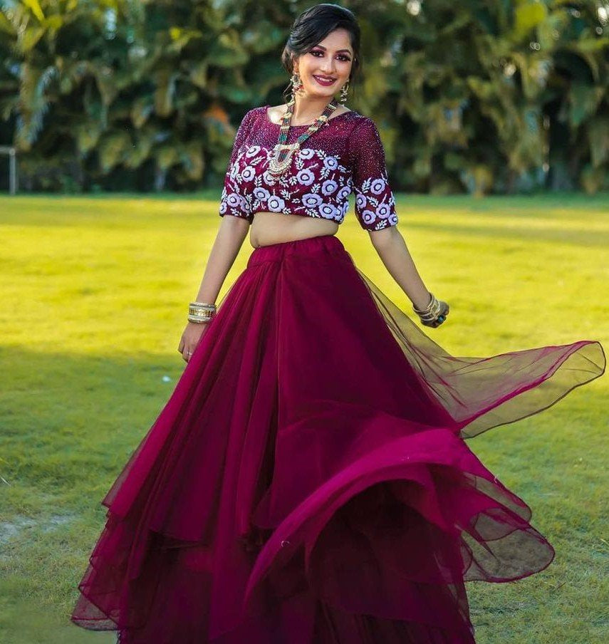 Wine soft net sequence embroidered work lehenga choli