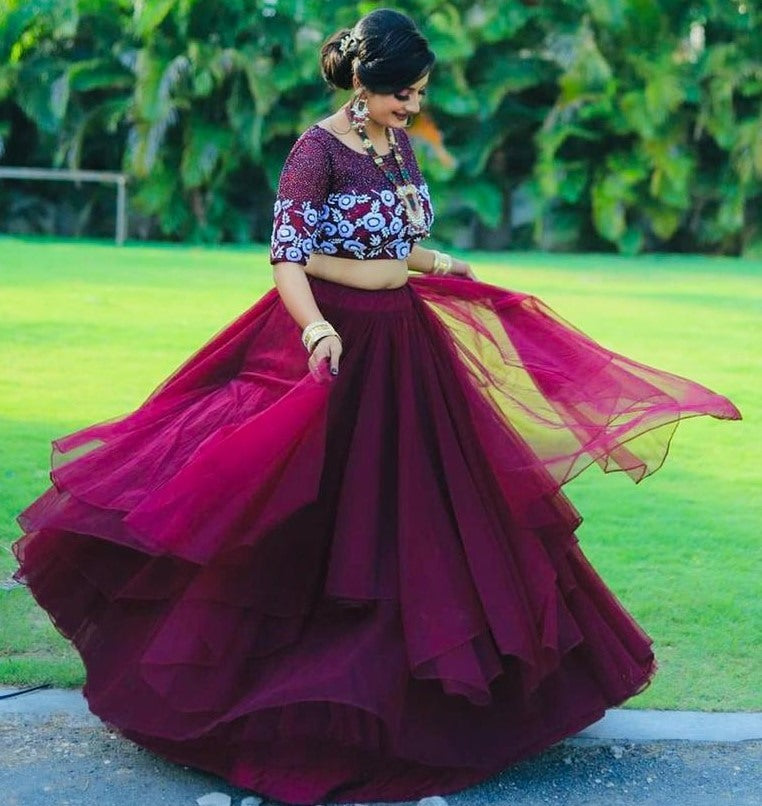 Wine soft net sequence embroidered work lehenga choli