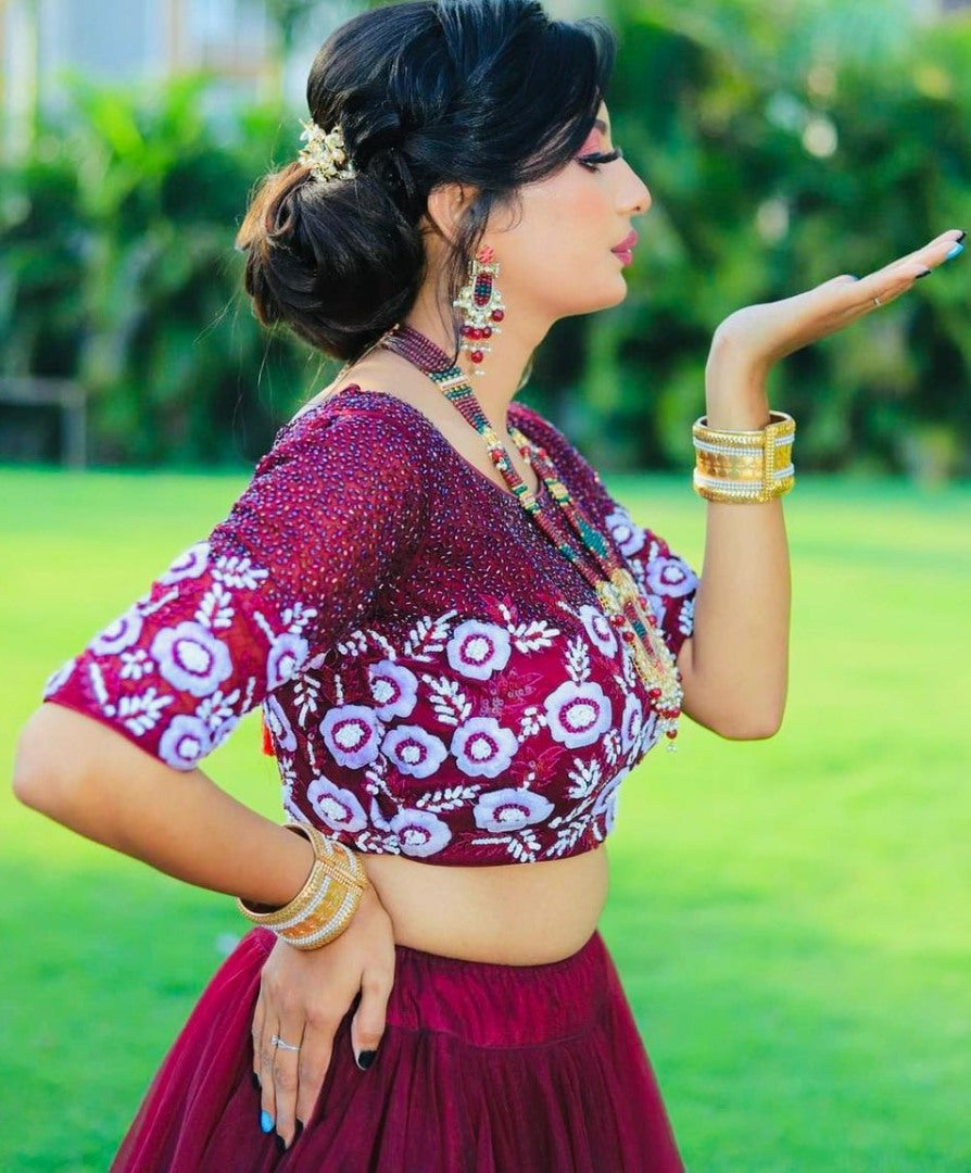 Wine soft net sequence embroidered work lehenga choli