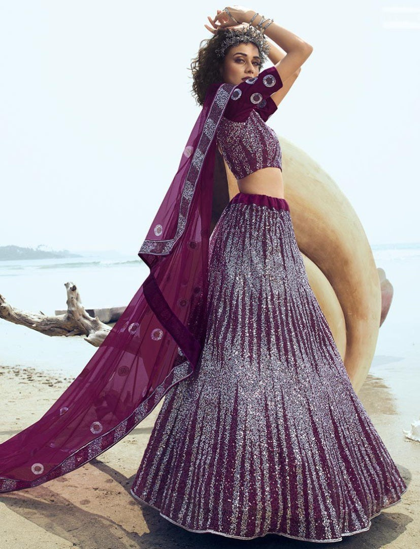 Wine soft net sequence work ceremonial lehenga choli