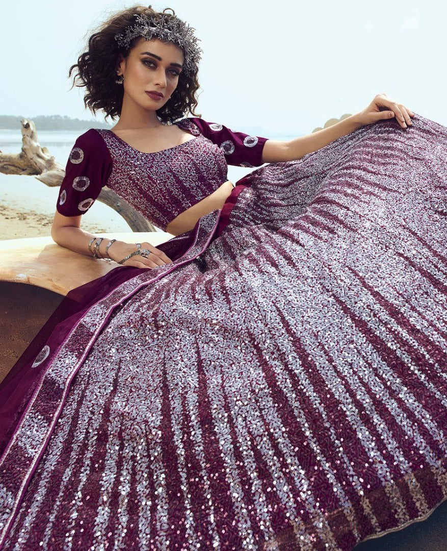Wine soft net sequence work ceremonial lehenga choli