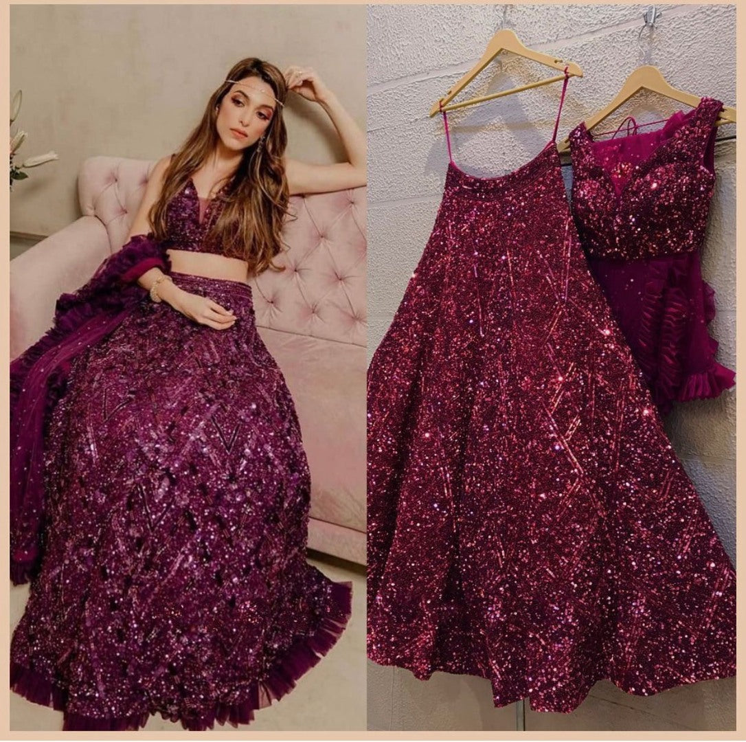 Wine velvet heavy thread and sequence embroidered ruffle border wedding lehenga choli