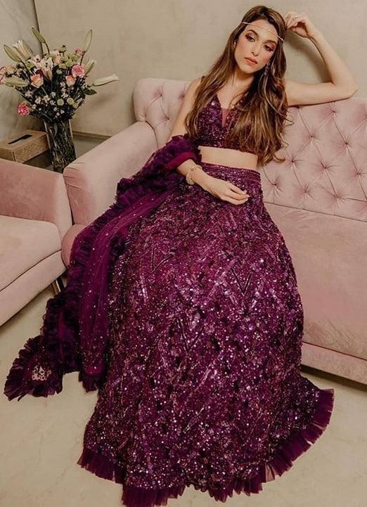 Wine velvet heavy thread and sequence embroidered ruffle border wedding lehenga choli