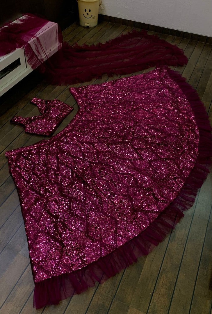 Wine velvet heavy thread and sequence embroidered ruffle border wedding lehenga choli