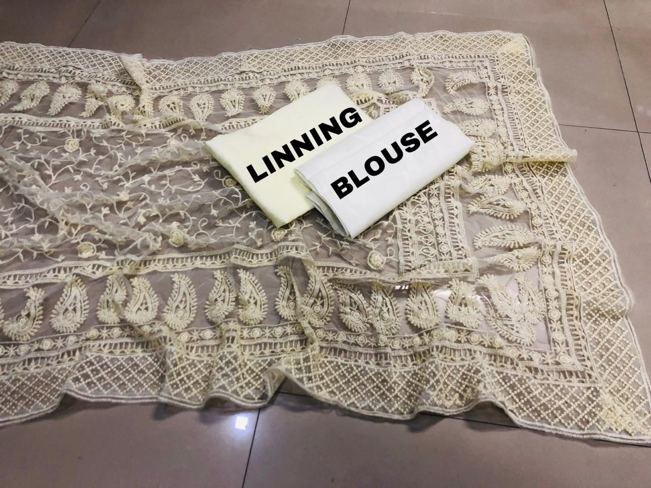 yami gautam off white net heavy embroidered threadwork and motiwork designer saree