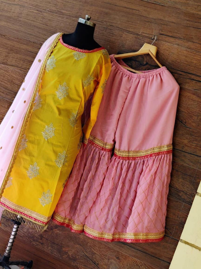 yellow and baby pink beautiful embroidered sharara salwar suit