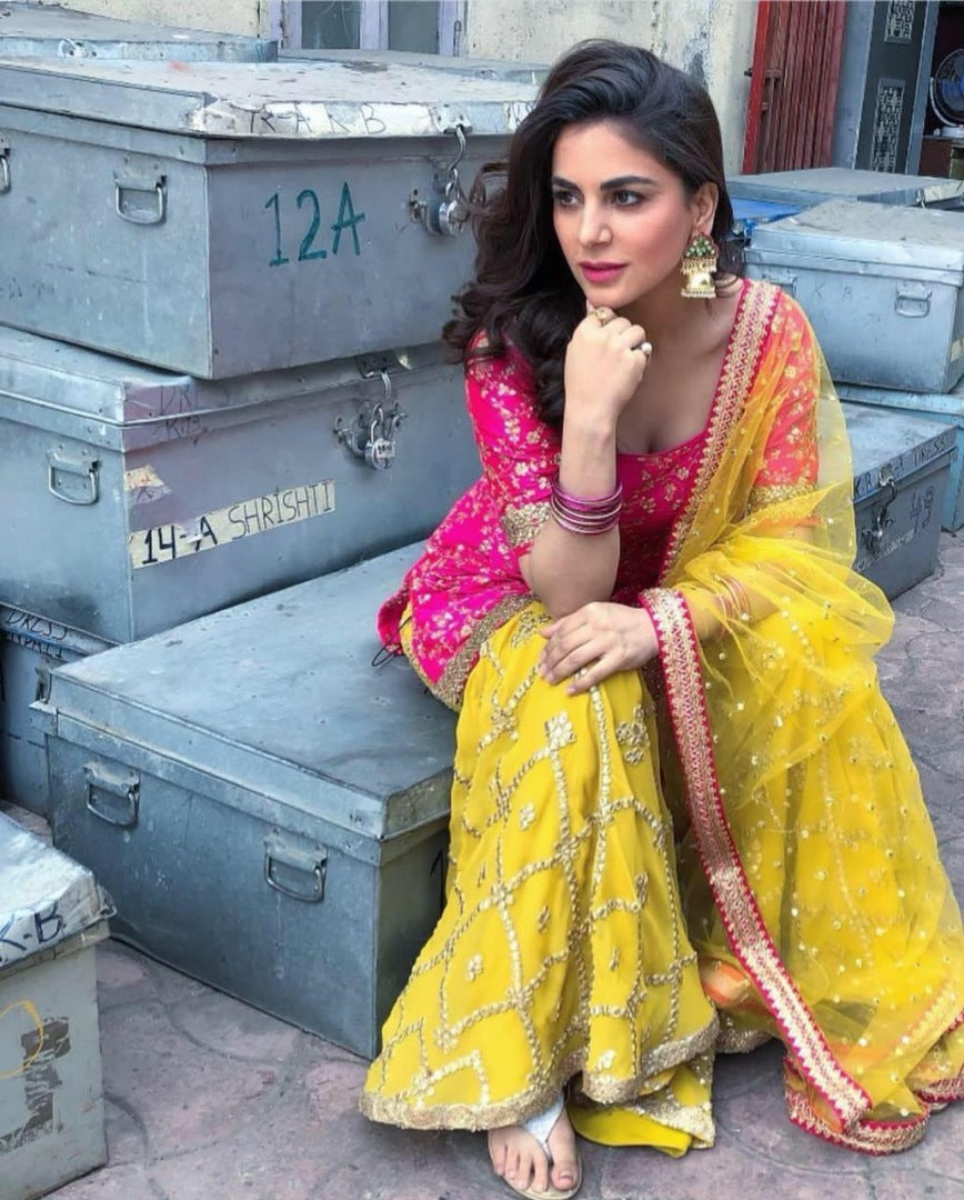 Yellow and pink tapeta silk embroidered plazzo salwar suit