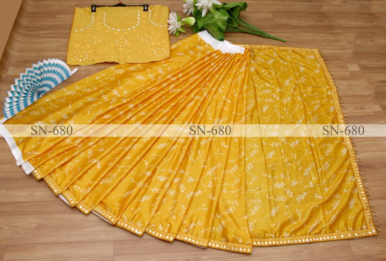 Yellow chinon silk printed paper mirror work border saree