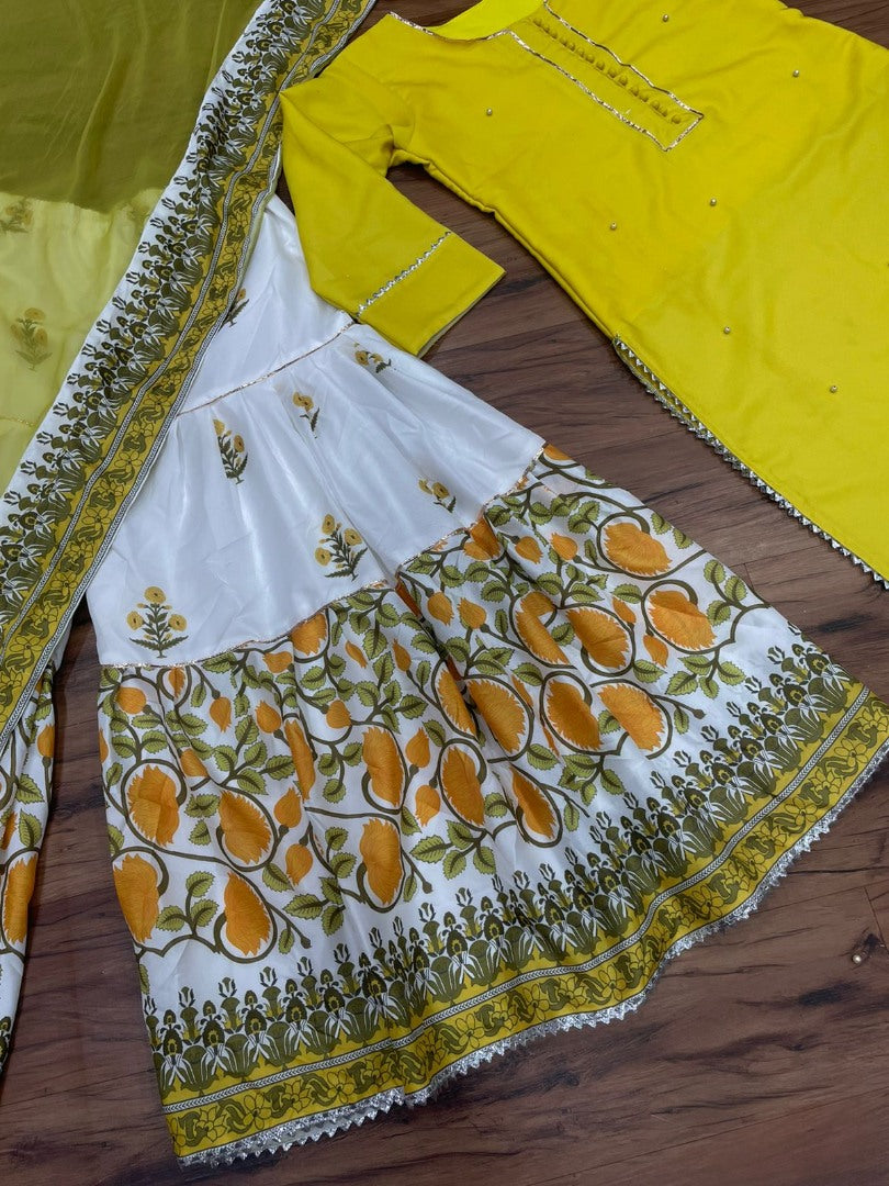 Yellow cotton moti work and printed sharara suit