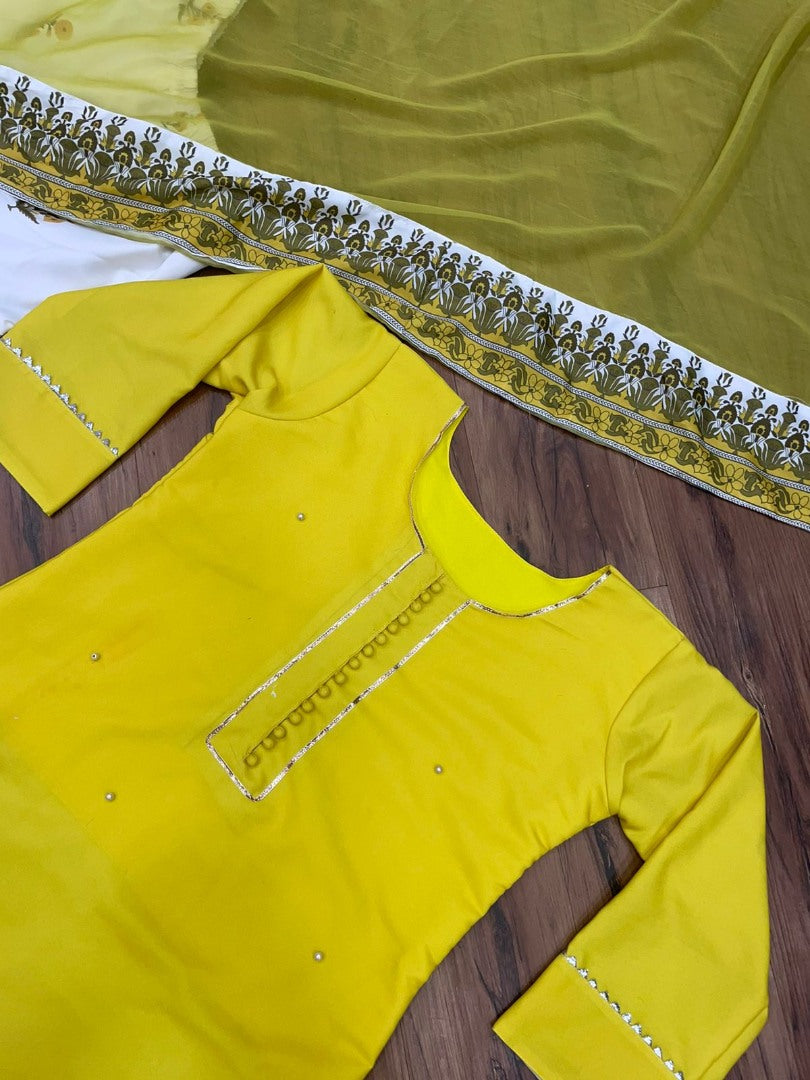 Yellow cotton moti work and printed sharara suit