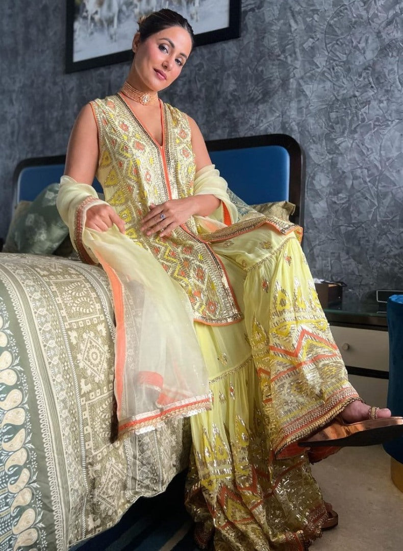 Yellow designer heavy embroidered sharara suit