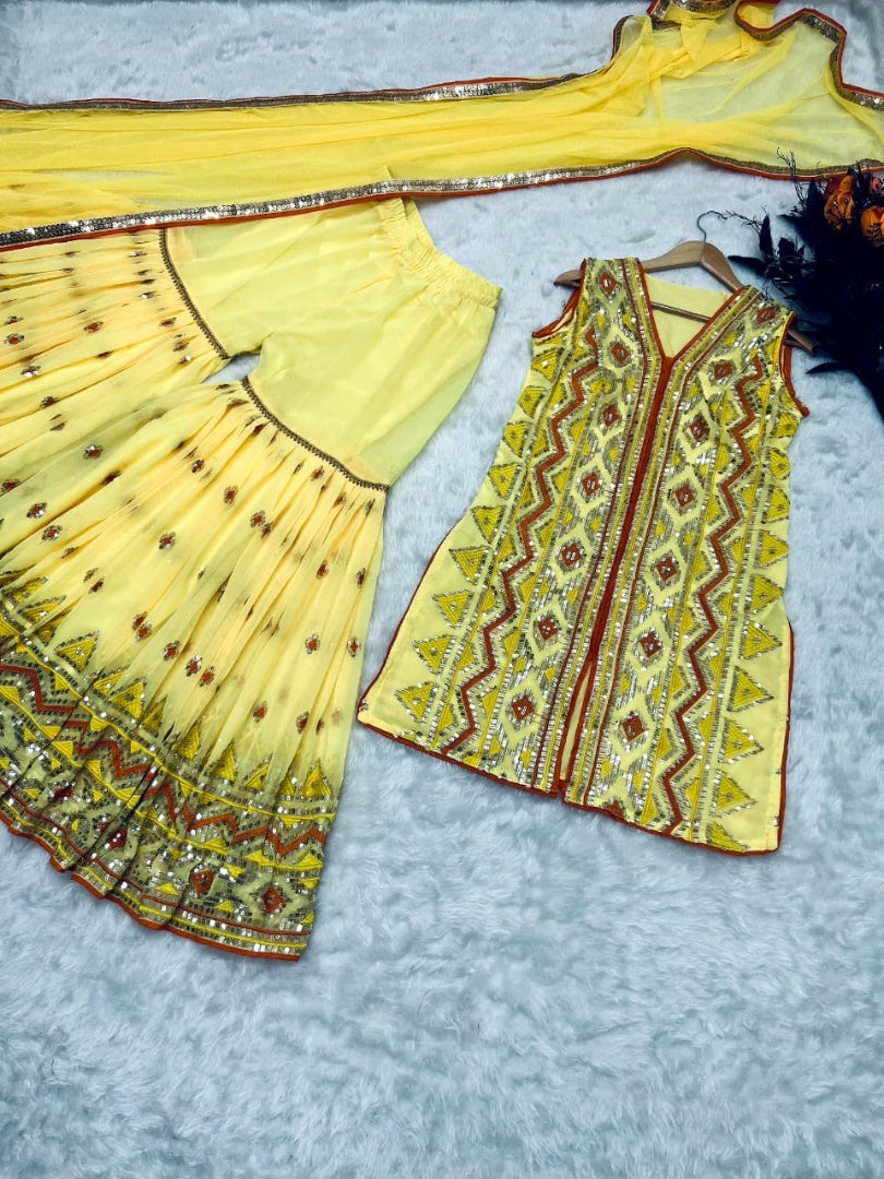 Yellow designer heavy embroidered sharara suit