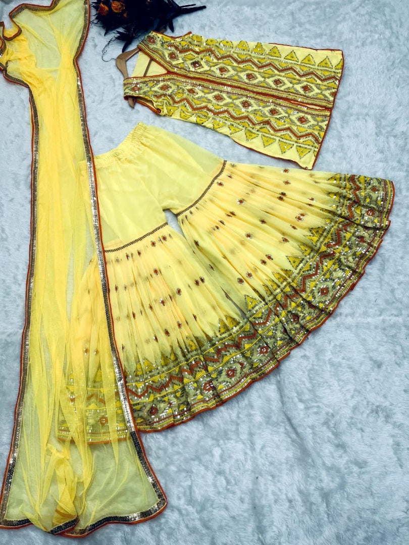 Yellow designer heavy embroidered sharara suit