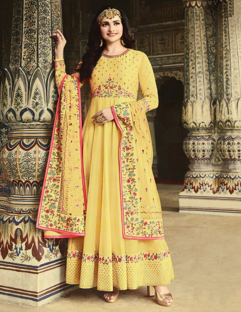 Yellow dola silk heavy embroidered designer anarkali gown