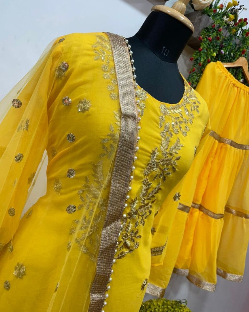 Yellow embroidered sharara salwar suit