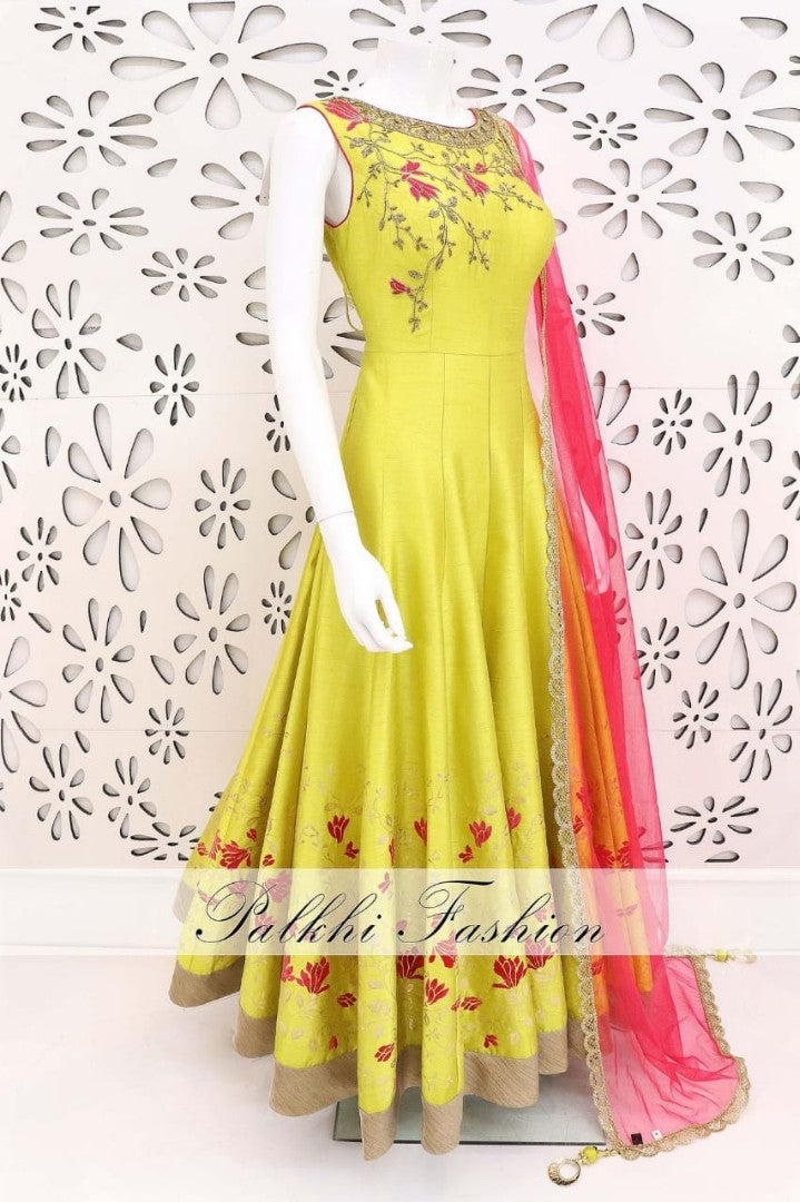 Yellow fusing covered banglori silk embroidered gown