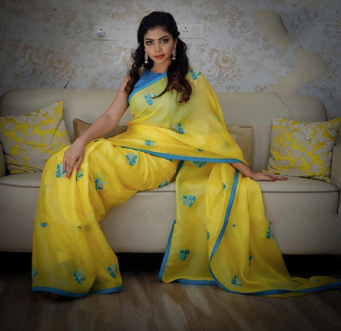 yellow georgette casual wear embroidered saree