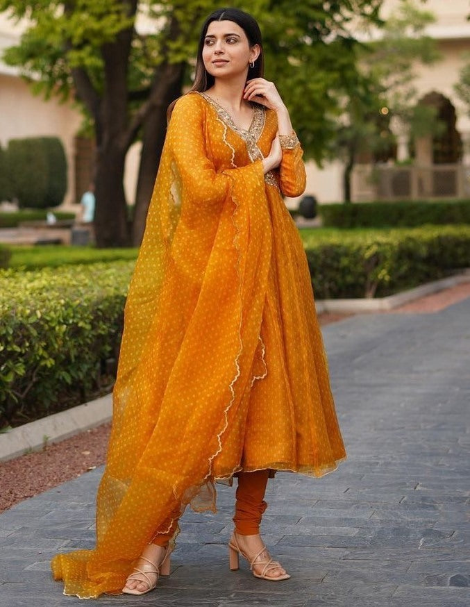 Yellow georgette dot printed flairy anarkali suit