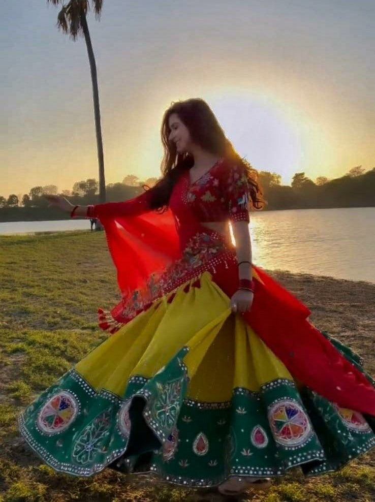 Yellow georgette embroidered and real mirror work festival lehenga choli