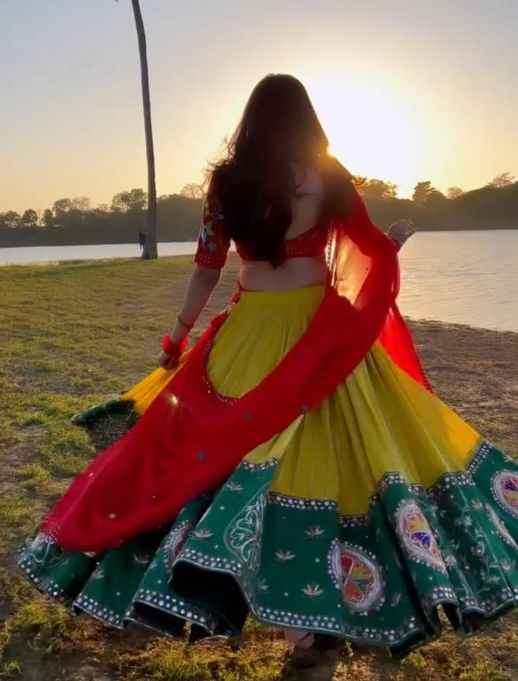 Yellow georgette embroidered and real mirror work festival lehenga choli