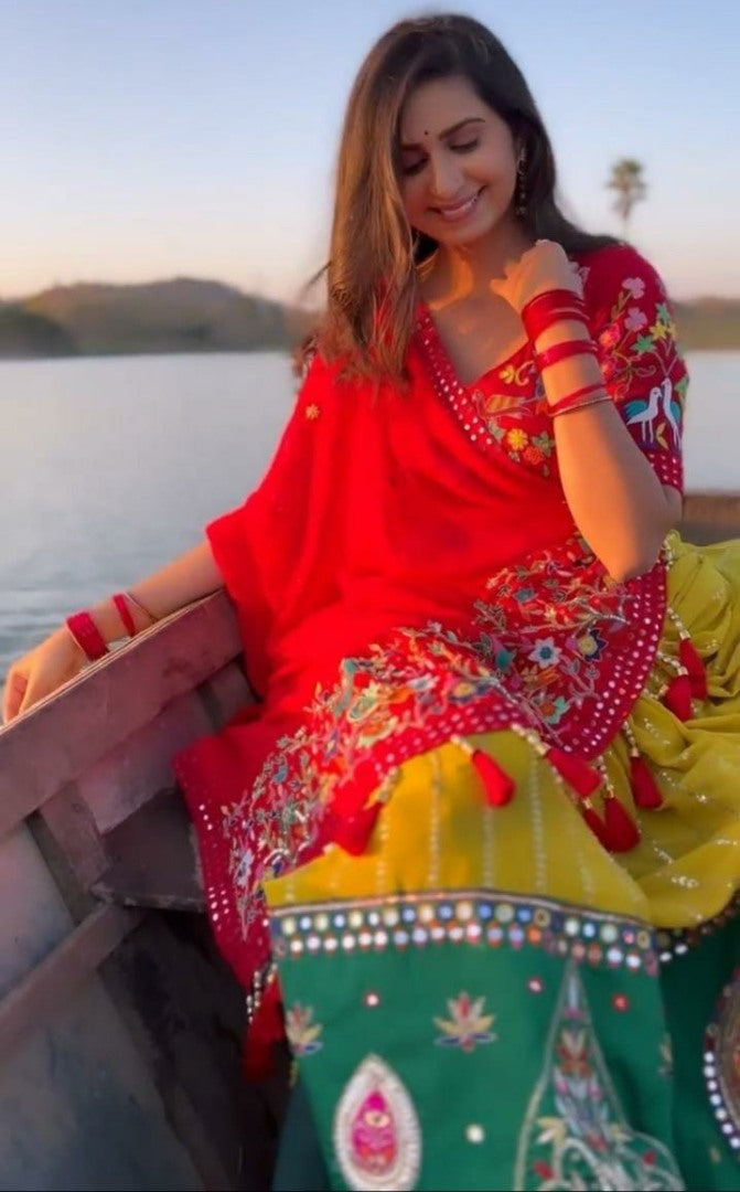 Yellow georgette embroidered and real mirror work festival lehenga choli