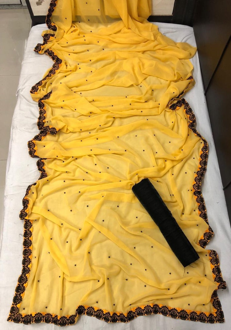 Yellow georgette embroidered border casual saree