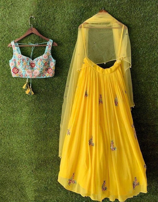 Yellow georgette embroidered lehenga choli for haldi ceremony