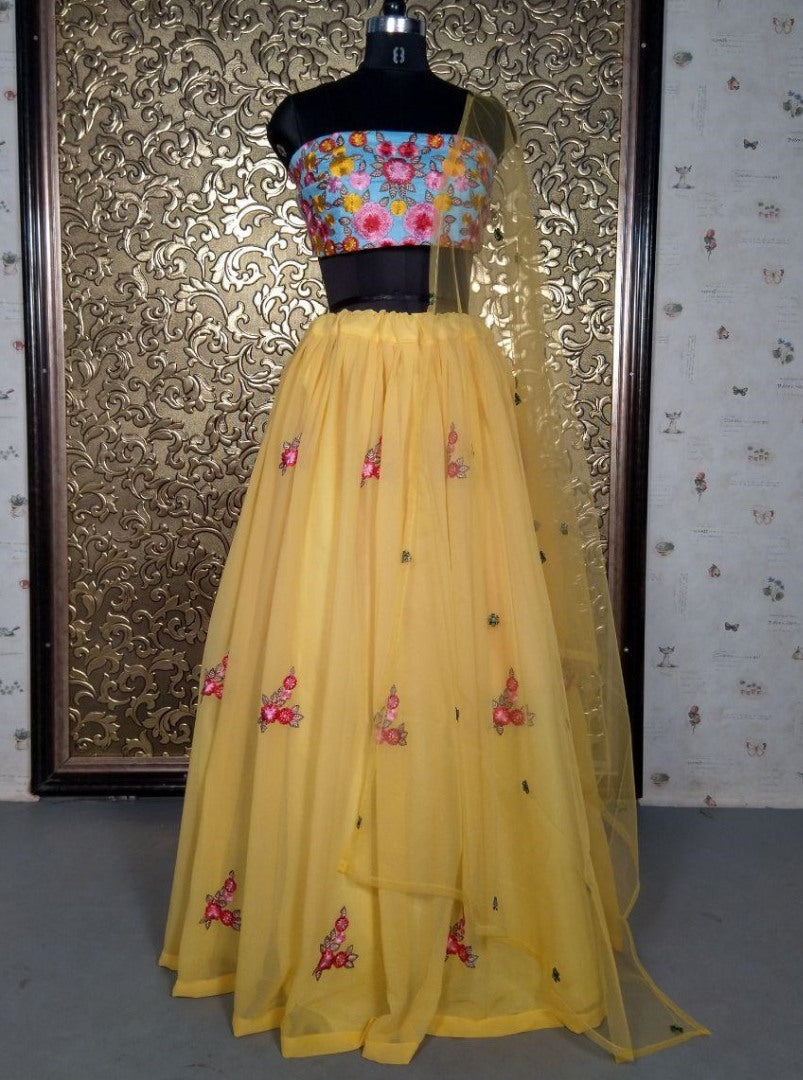 Yellow georgette embroidered lehenga choli for haldi ceremony
