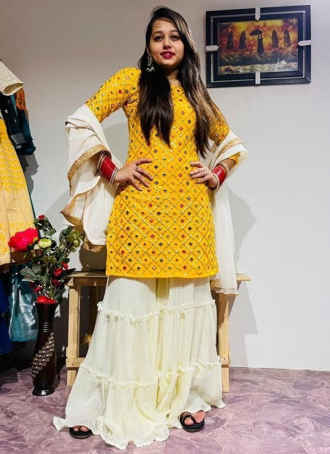 Yellow georgette embroidered sharara salwar suit
