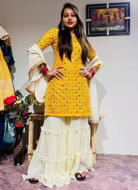 Yellow georgette embroidered sharara salwar suit