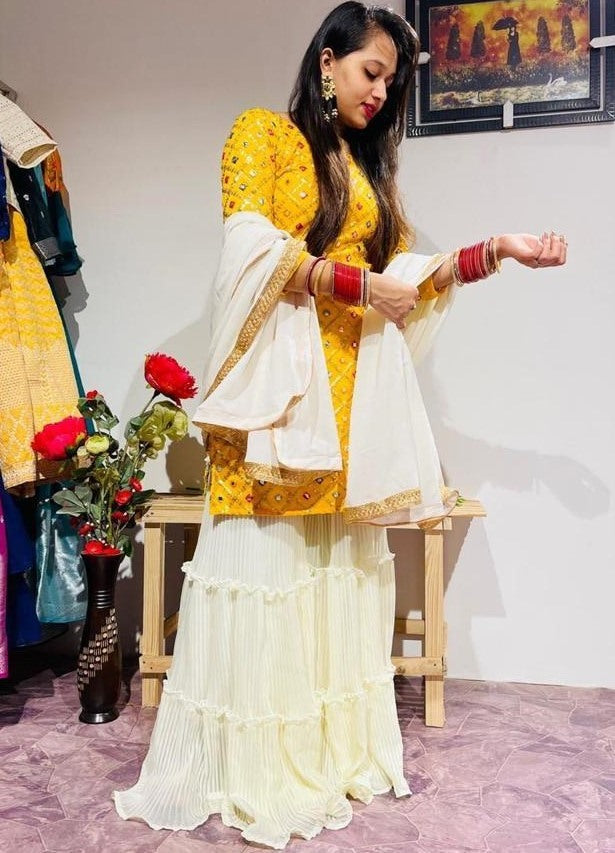 Yellow georgette embroidered sharara salwar suit