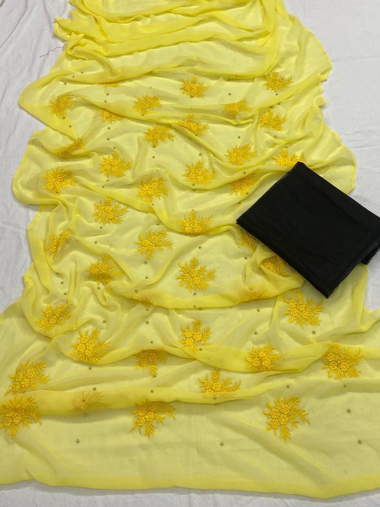 Yellow georgette embroidery and moti work saree