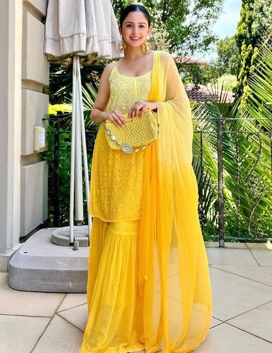 Yellow georgette embroidery work sharara suit for haldi ceremony