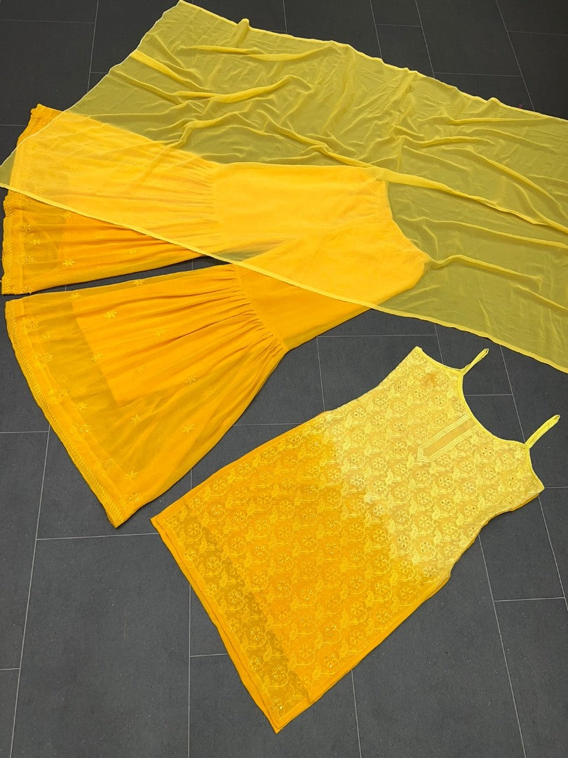 Yellow georgette embroidery work sharara suit for haldi ceremony