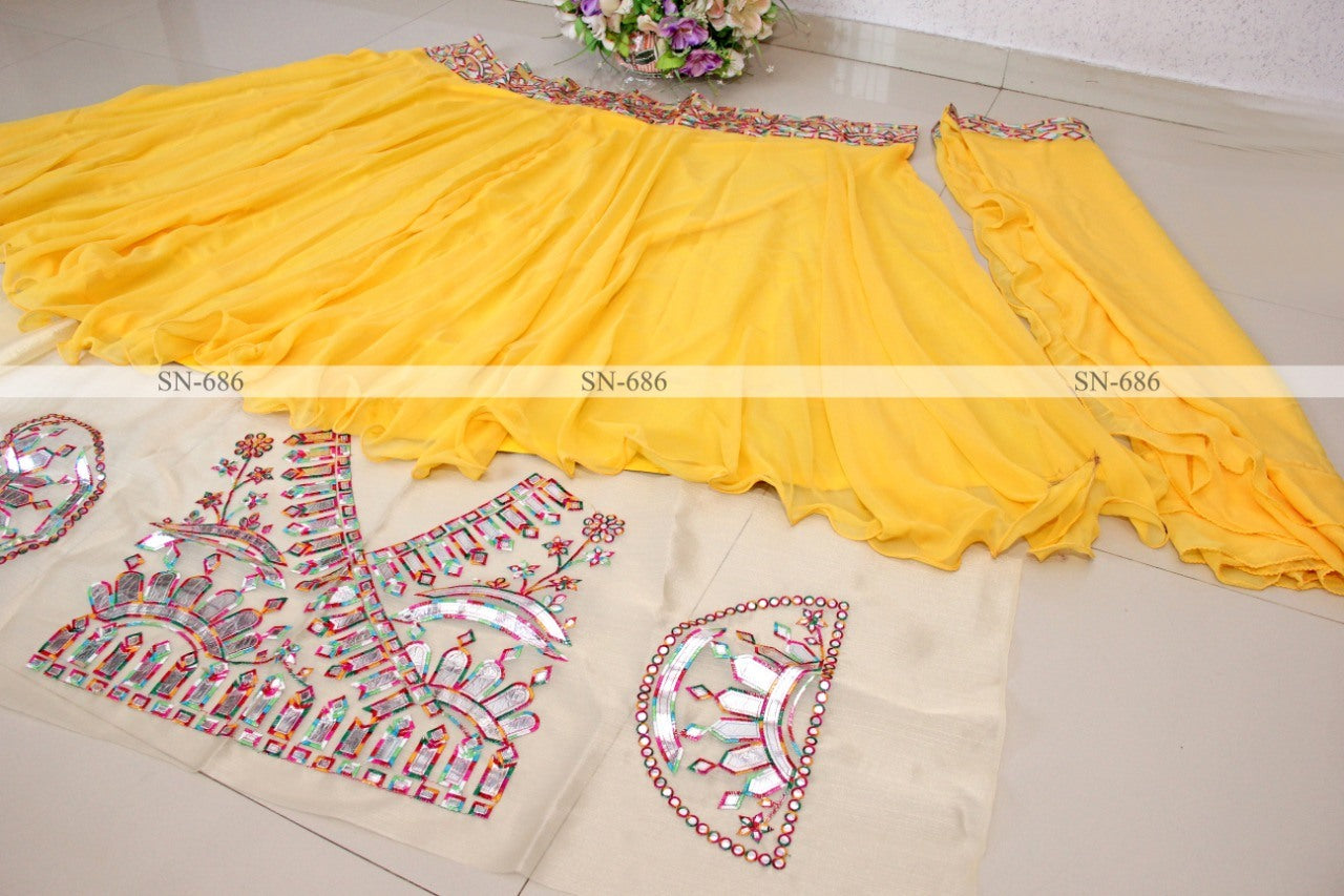 Yellow georgette fancy thread paper mirror work lehenga choli