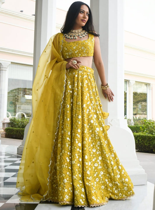Yellow georgette heavy embroidered lehenga choli for haldi ceremony