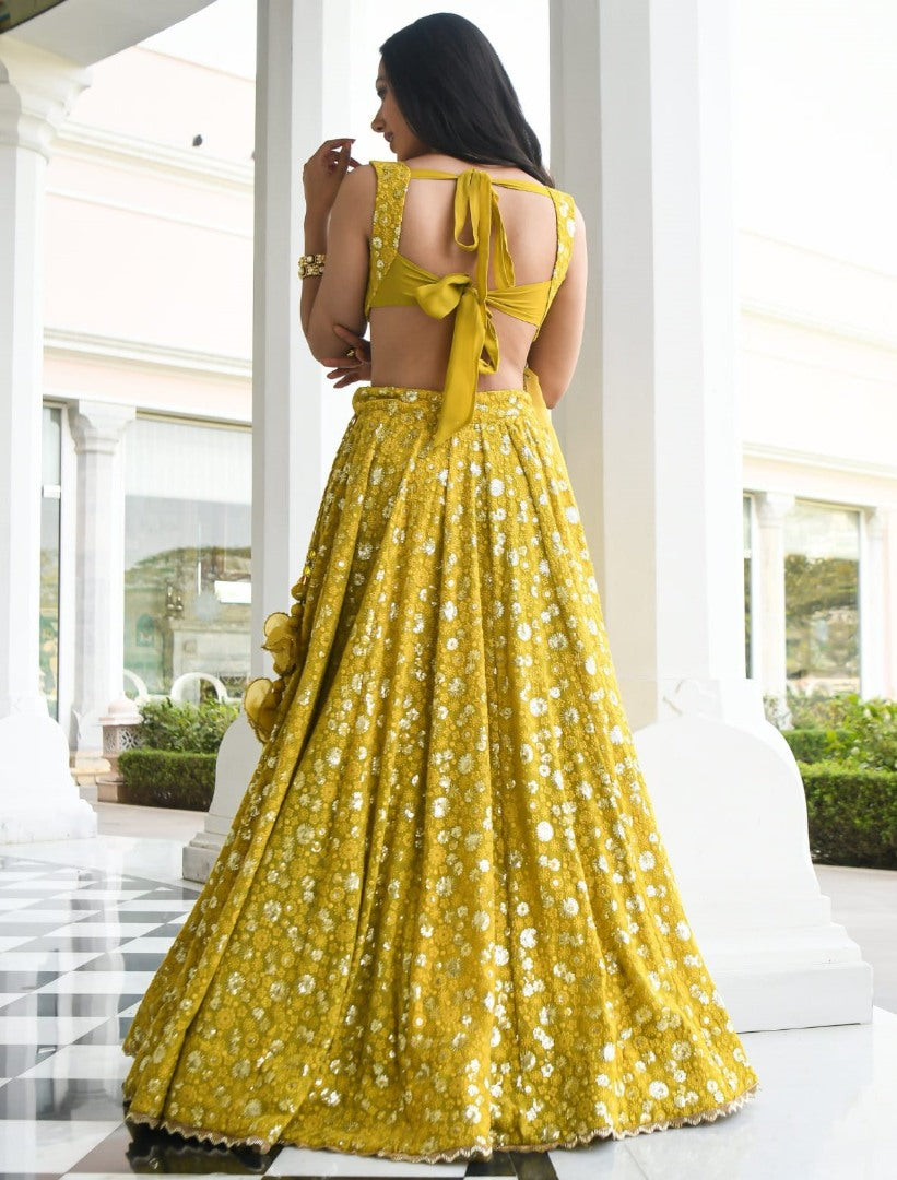 Yellow georgette heavy embroidered lehenga choli for haldi ceremony