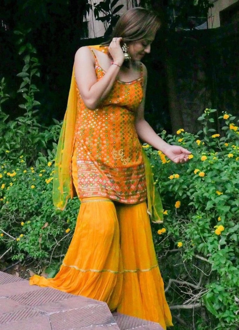 Yellow georgette heavy embroidered sharara salwar suit