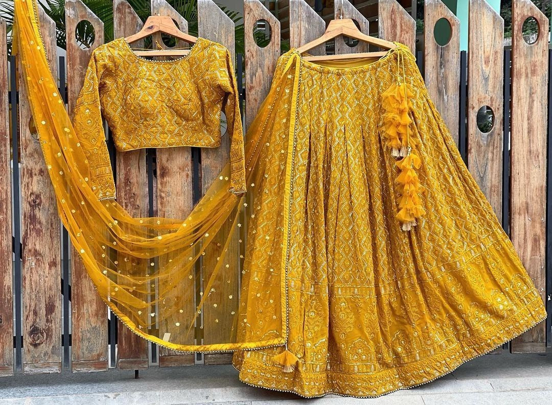 Yellow georgette heavy embroidered wedding lehenga choli