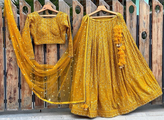 Yellow georgette heavy embroidered wedding lehenga choli