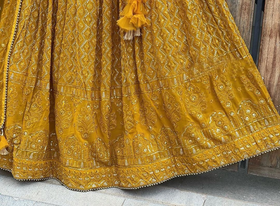 Yellow georgette heavy embroidered wedding lehenga choli