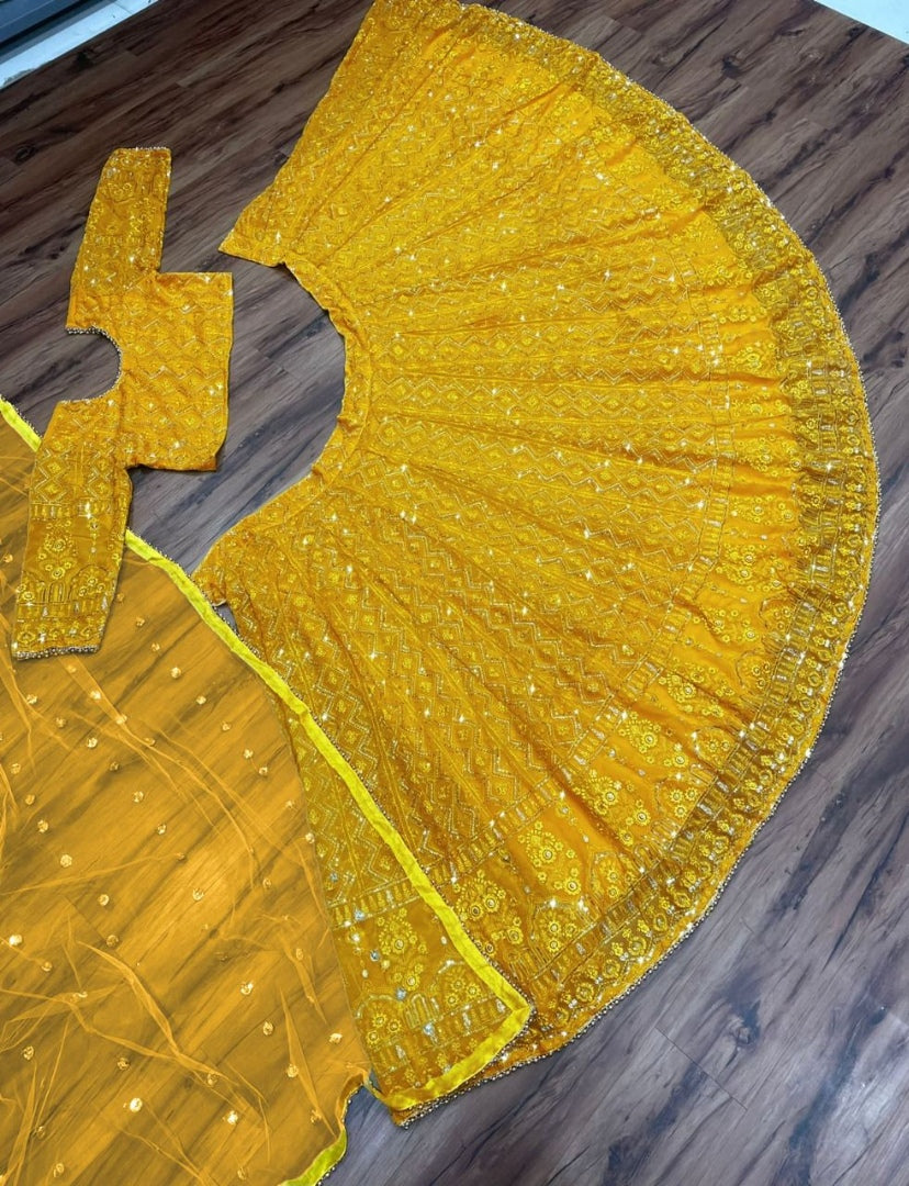 Yellow georgette heavy embroidered wedding lehenga choli