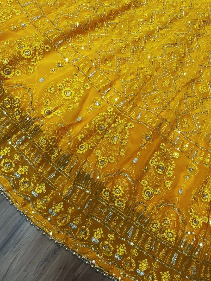 Yellow georgette heavy embroidered wedding lehenga choli