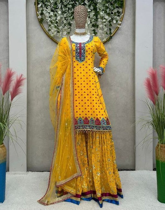 Yellow georgette heavy embroidery work sharara suit for haldi ceremony